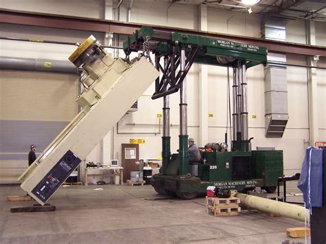 Morgan machinery moving  The main challenge to solve involved the height-restricted placement of the smaller air handler across a 10-foot void